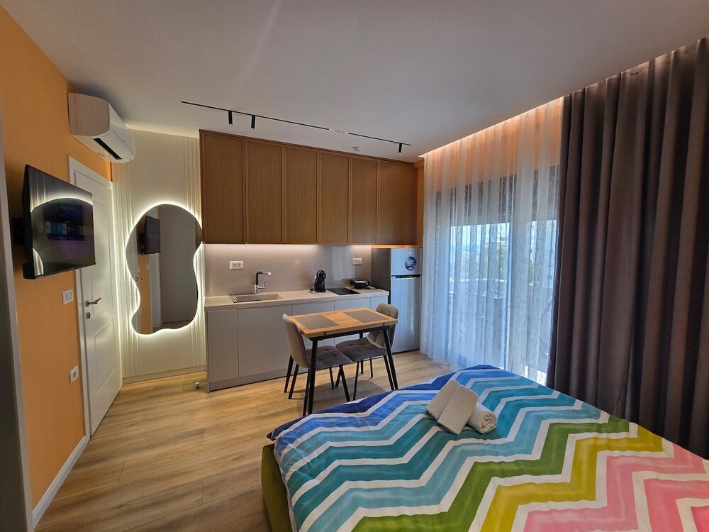 Bedroom with a desk workspace facing the window