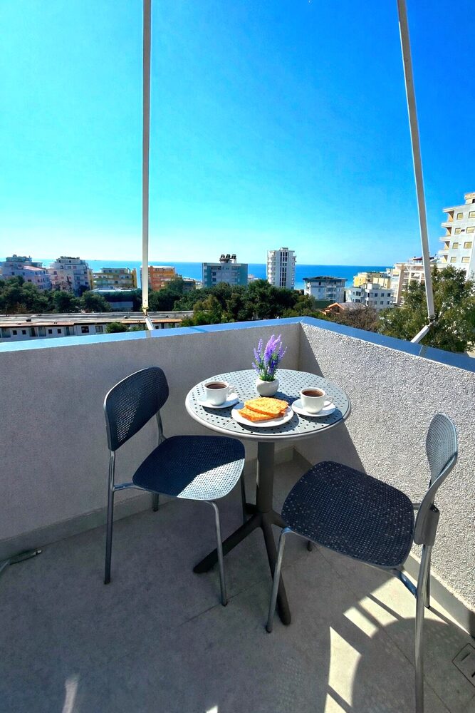 Balcony breakfast table with sea view