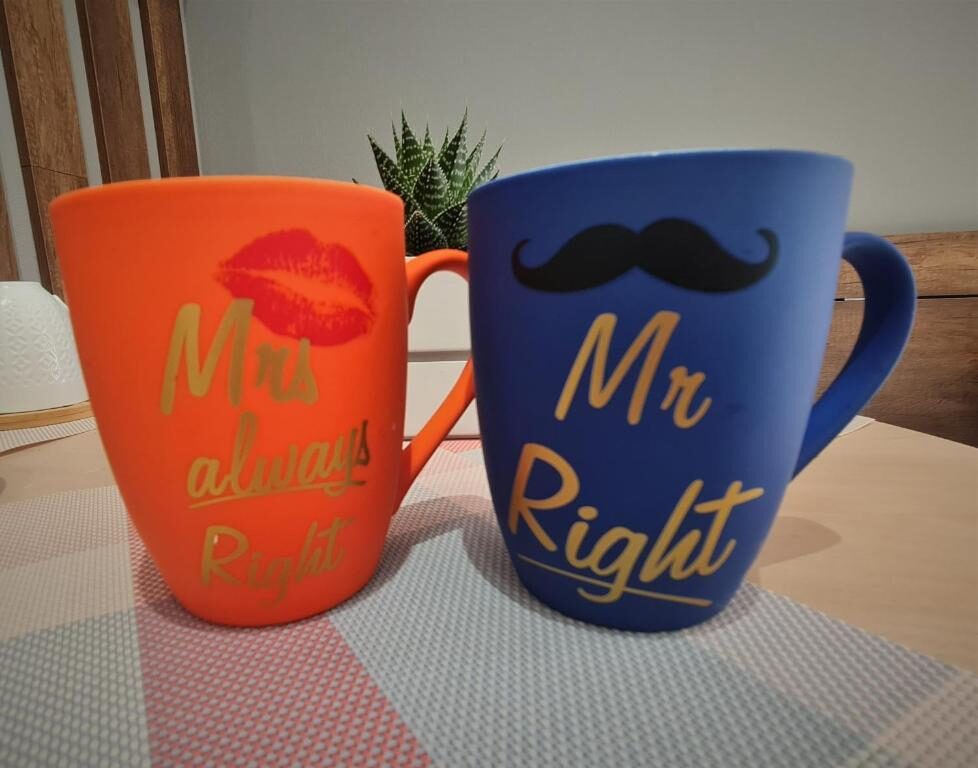 A pair of matching coffee mugs, a small welcome touch