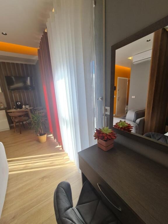 Entry hallway with a decorative mirror