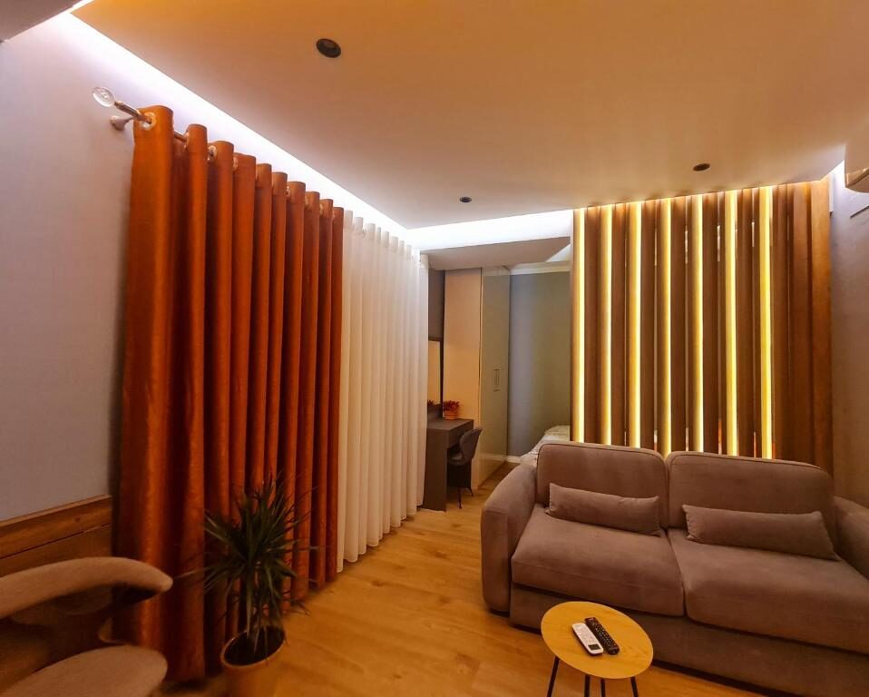 Living room seating area with warm accent lighting